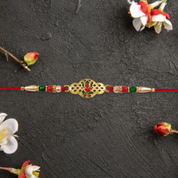 Gold-Toned Ganesha Rakhi for Brother – Auspicious & Elegant Design
