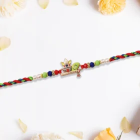Kalash Rakhi with Flute & Peacock Feather – Symbol of Devotion and Grace