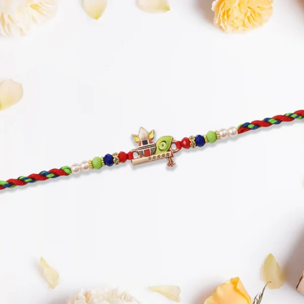 Kalash Rakhi with Flute & Peacock Feather – Symbol of Devotion and Grace
