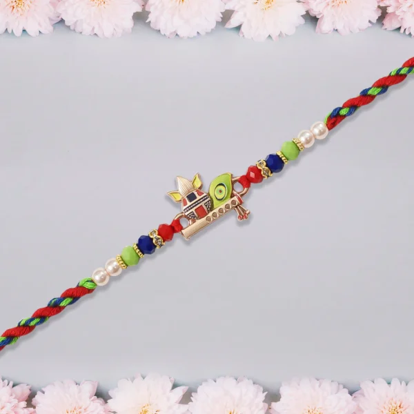 Kalash Rakhi with Flute & Peacock Feather – A Divine Raksha Bandhan Thread