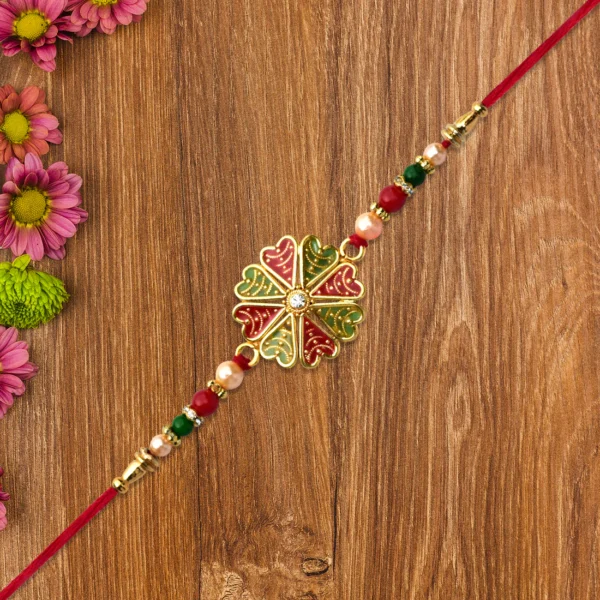 Handcrafted Rakhi with Bold Floral Design and Decorative Thread