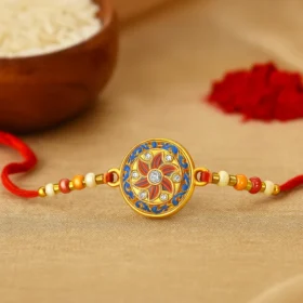 Royal Blue & Red Handcrafted Rakhi – Floral Design for Bhai