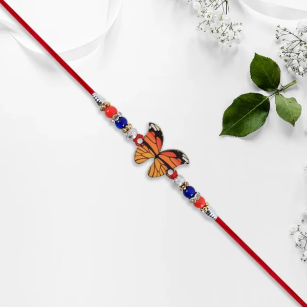 Vibrant Butterfly Rakhi with Red Mauli Thread and Colorful Beads