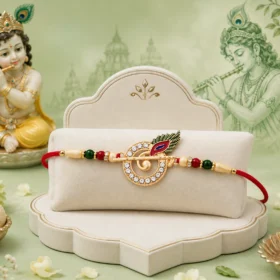 Krishna Flute Rakhi with Stone Studded Peacock Feather Design