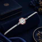 Round Shape Silver Chain Rakhi with Red-Green Accents