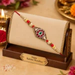 Royal Designer Rakhi with Kundan Centerpiece, Red & Green Enamel Work, and Golden Beads – Rakhi with Roli & Chawal