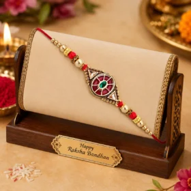 Royal Designer Rakhi with Kundan Centerpiece, Red & Green Enamel Work, and Golden Beads – Rakhi with Roli & Chawal